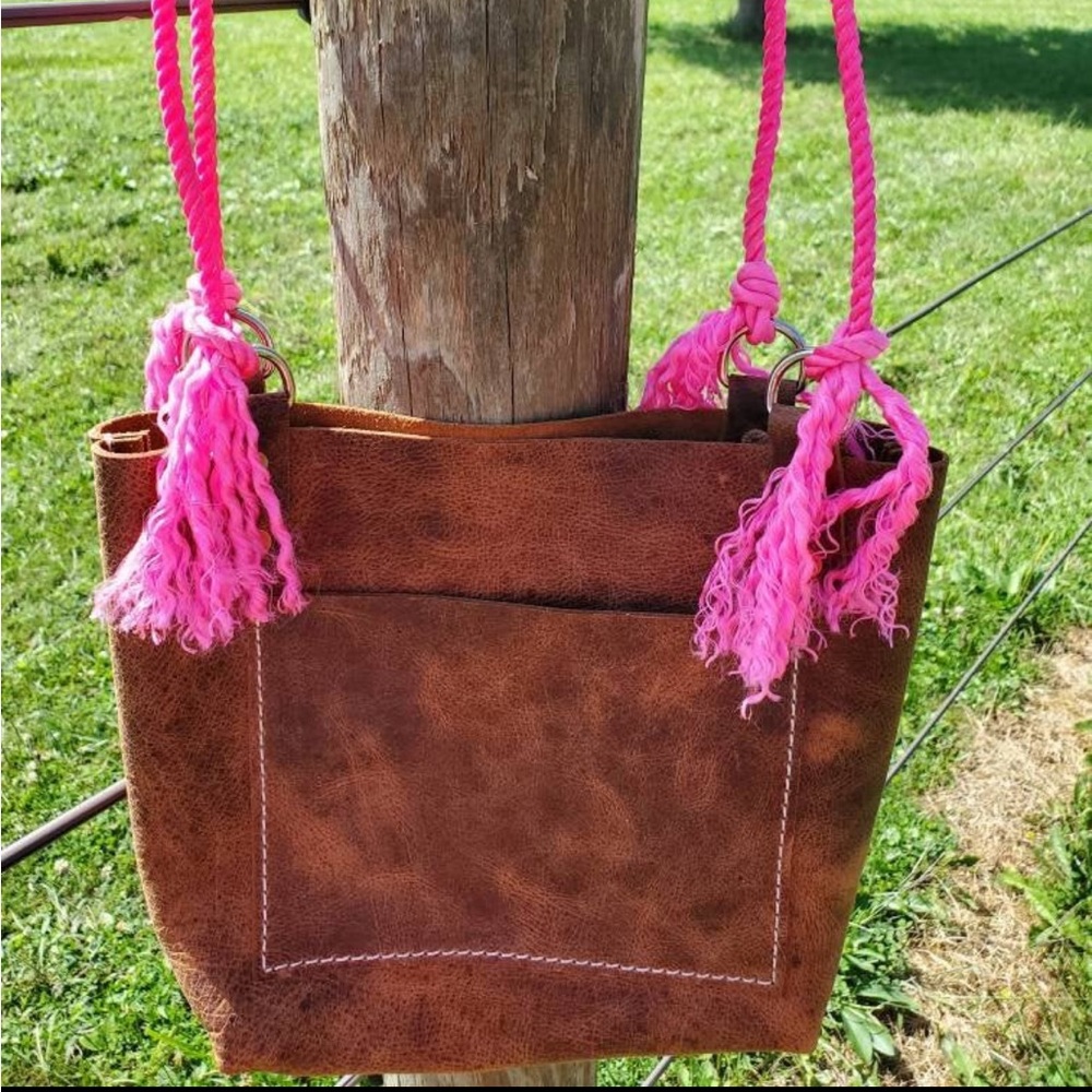 Beautiful Handmade bag. Made with buffalo leather and “cowboy rope”.